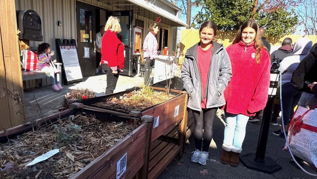 Community members at a local event supporting the Ten Thousand Reasons initiative.